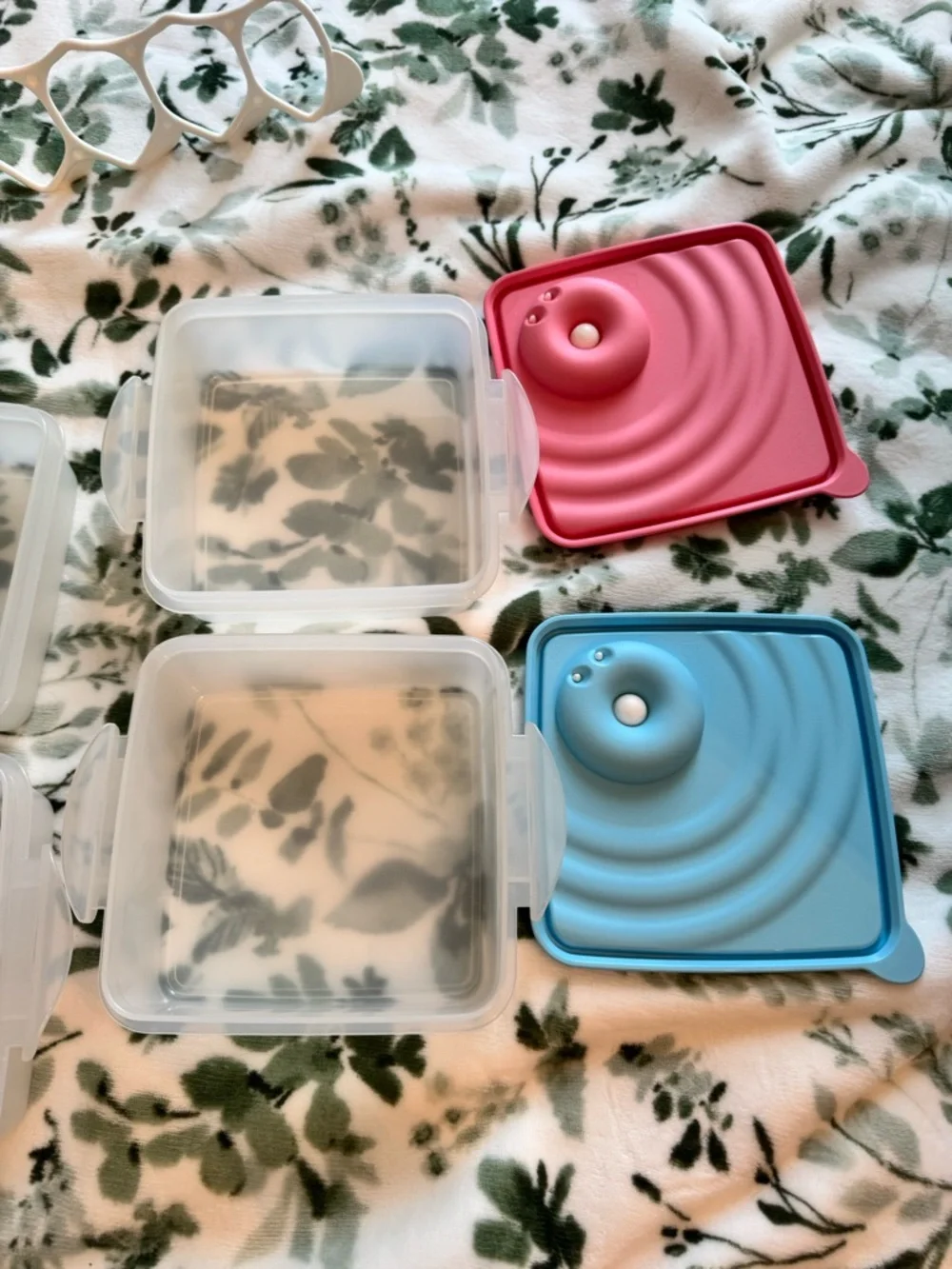 Tupperware Stacked food storage containers with carrier handle